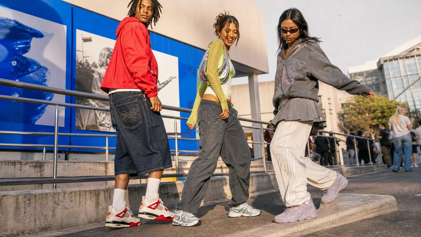 Young street-style group wearing Air Jordan 4, ASICS Gel-Kayano 14 and Yeezy 500 sneakers